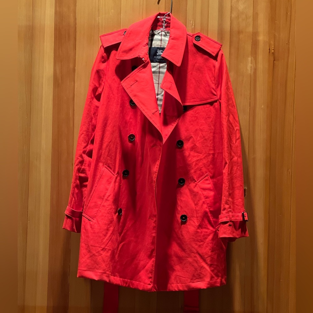 Burberry women’s red midlength trench coat